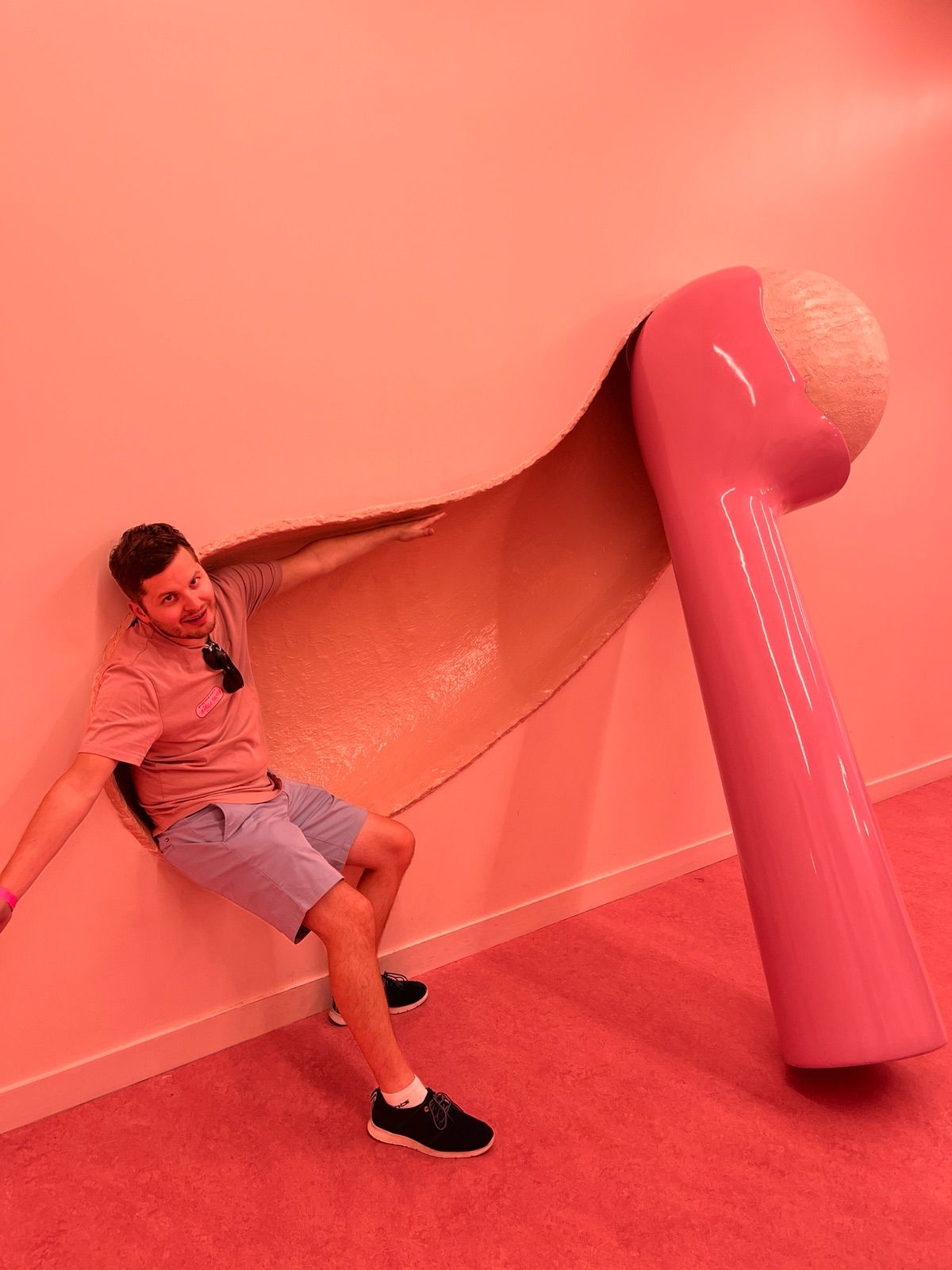 Vegard beside an oversized ice cream scoop.